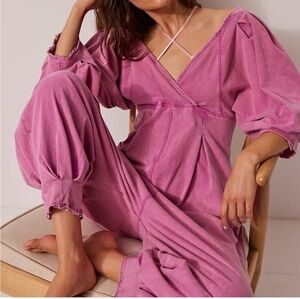 Free People Lotta Love Romper In A Washed Pink Color with Pockets